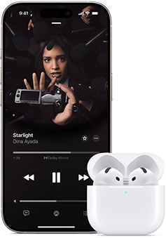 iPhone next to AirPods Pro in charging case, case is open