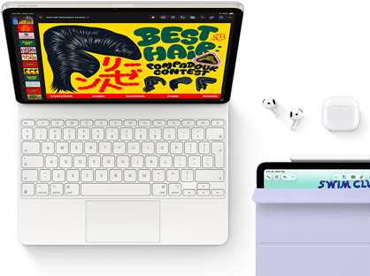 iPad Air, Starlight color, colorful graphics on screen, attached to Magic Keyboard, Airpods Pro and Apple Pencil Pro accessories