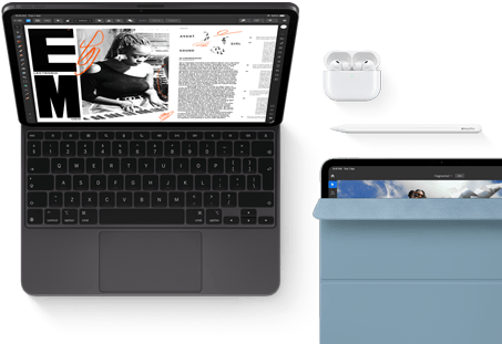 iPad Pro attached to Magic Keyboard, front exterior, space black color, rounded corners, black display bezel, open, display showing article editing app with text and photograph of a woman playing music, Airpods 4 in open case, blue Smart Folio cover on iPad Pro with Apple Pencil Pro resting atop device, cover slightly open revealing display
