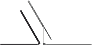 2 iPad Pro devices attached to Magic Keyboard, side exterior, thin profile, space black color with speakers and USB-C port, tilted half open, silver color, open, tilted back showing the keyboard’s floating cantilever design, speakers and microphone
